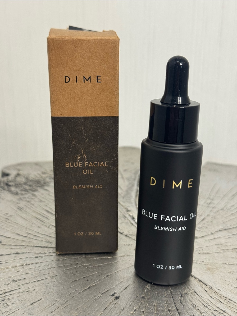 DIME Blue Facial Oil Blemish Aid. Retails for $38. Box open but unused.